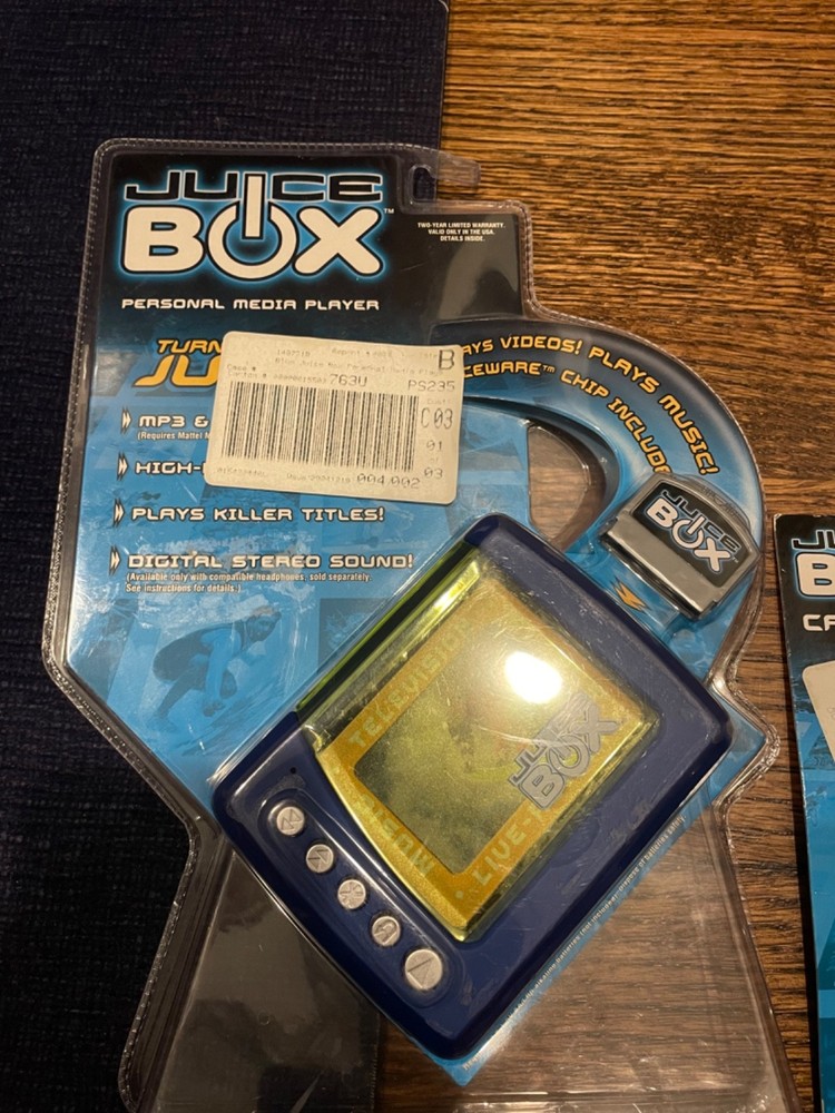 Juice Box Media Player with headphones and car adapter jack