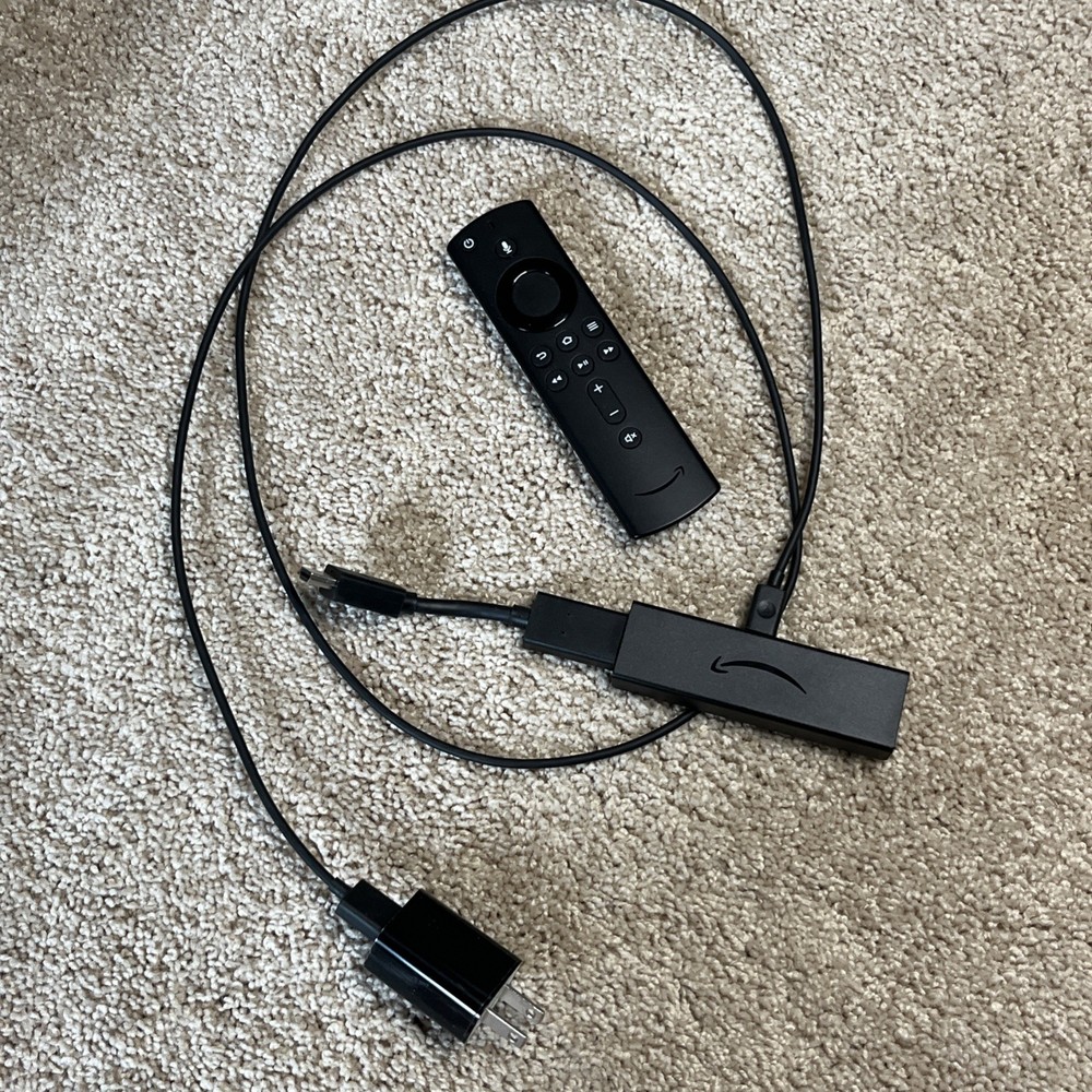 Amazon Fire TV Stick Only 4K Model E9L29Y Stick, Cord, HDMI Adapter & Remote