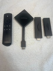 Amazon Fire TV Stick E9L29Y, LY73PR, LDC9WZ and a remote